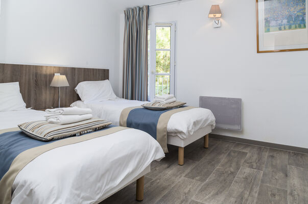 ilederé-hauts-de-cocraud-chambre-lits-doubles.jpg