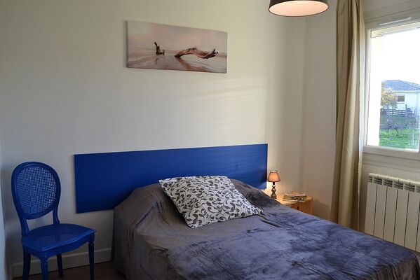 Chambre de la maison de vacances Les Trois Pins