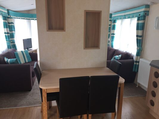 saint-maurice-etusson-camping-la-raudiere-mobile-home-salon.jpg_9