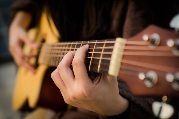 person-playing-guitar-2118045