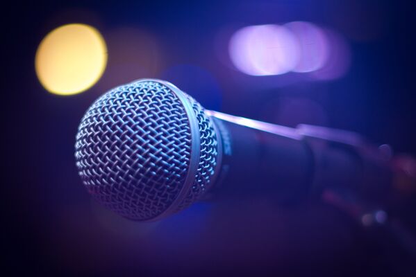 tilt-shift-photograph-of-gray-and-black-microphone-164879-2