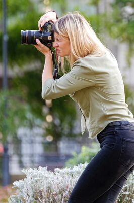 woman-taking-photo-2897153