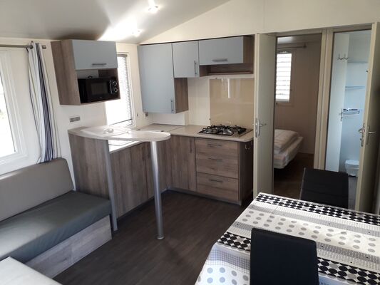 Interieur Super Titania 1-4 personnes + 2 enfants lit canape sejour