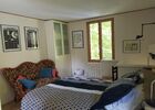 Le Mas Albizia - Vue chambre avec banquette vintage