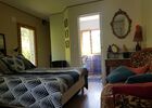 Le Mas Albizia - Vue chambre avec banquette vintage